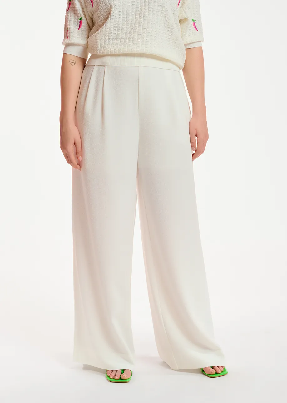 Pantalon blanc cassé à jambes larges
