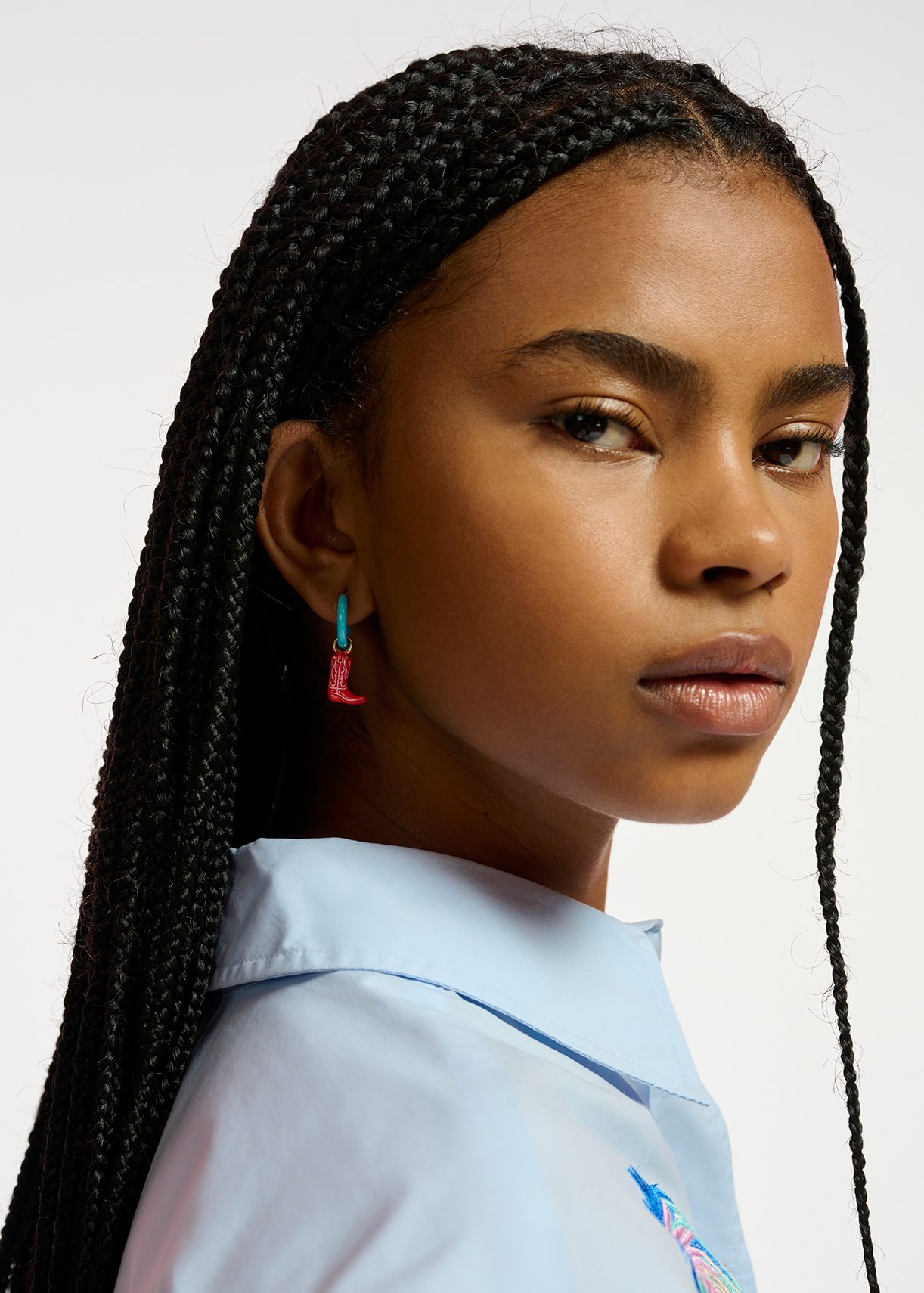 Light blue hoop earrings with cowboy boot and rooster pendants