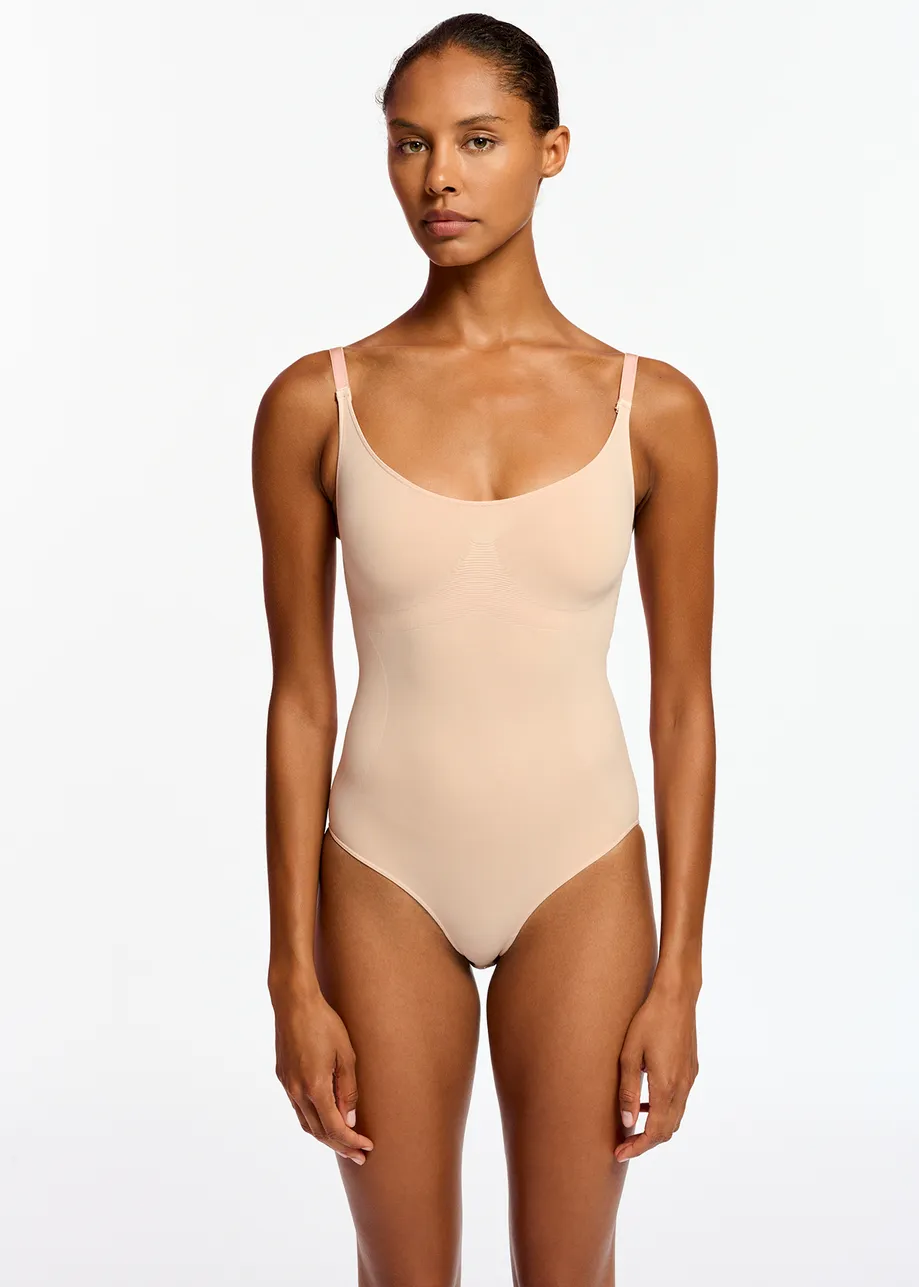 Beige sculpting bodysuit