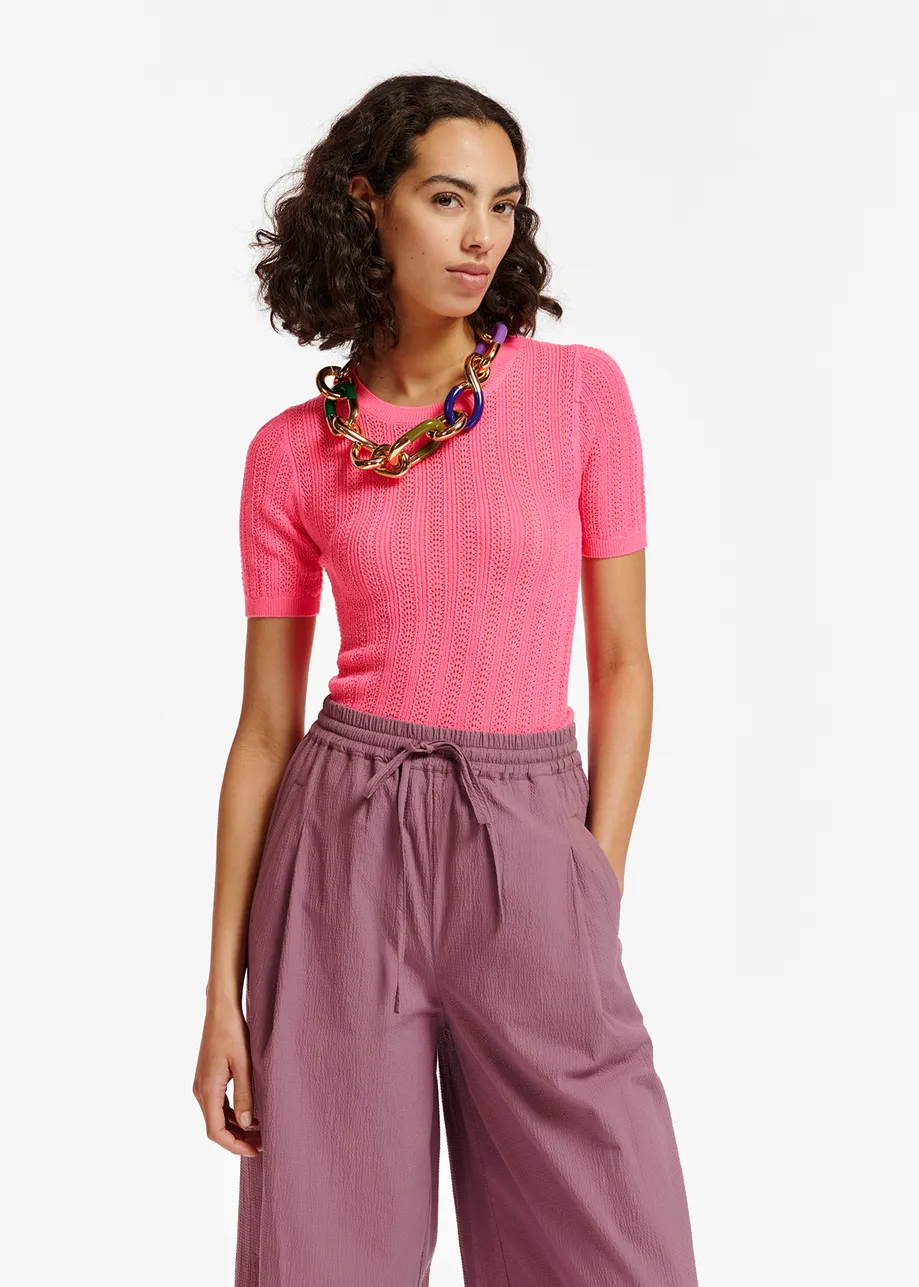 Pink pointelle-knit top