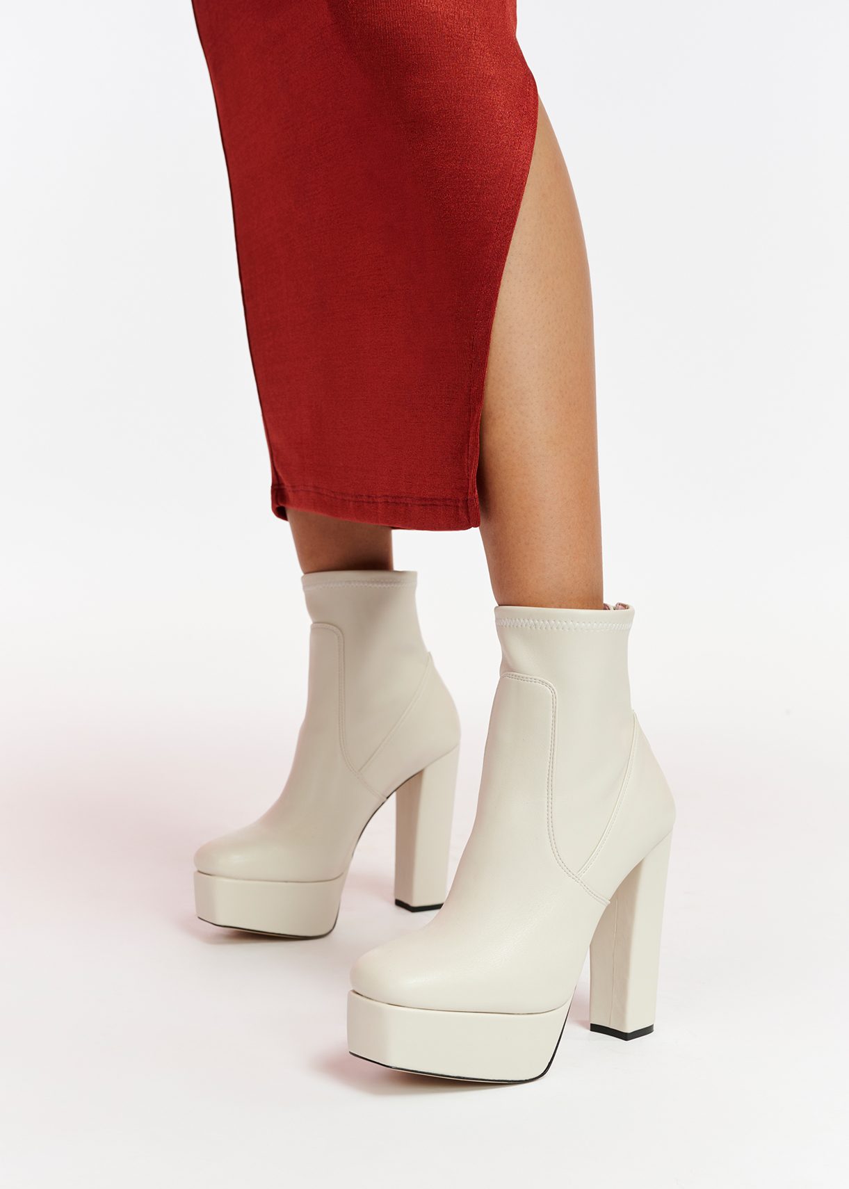 Off-white faux leather platform ankle boots