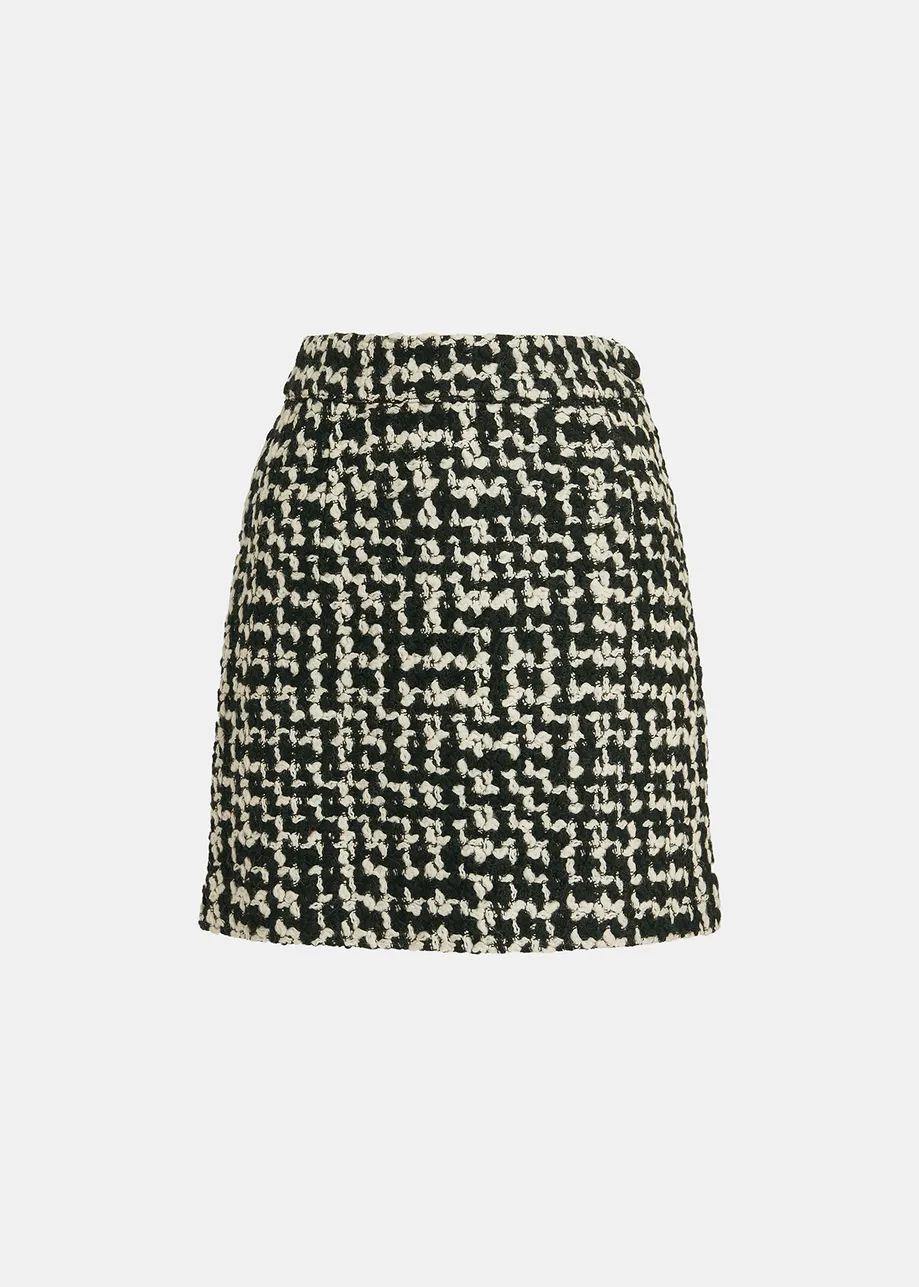 Mini-jupe en tweed de laine mélangée noire et blanc cassé