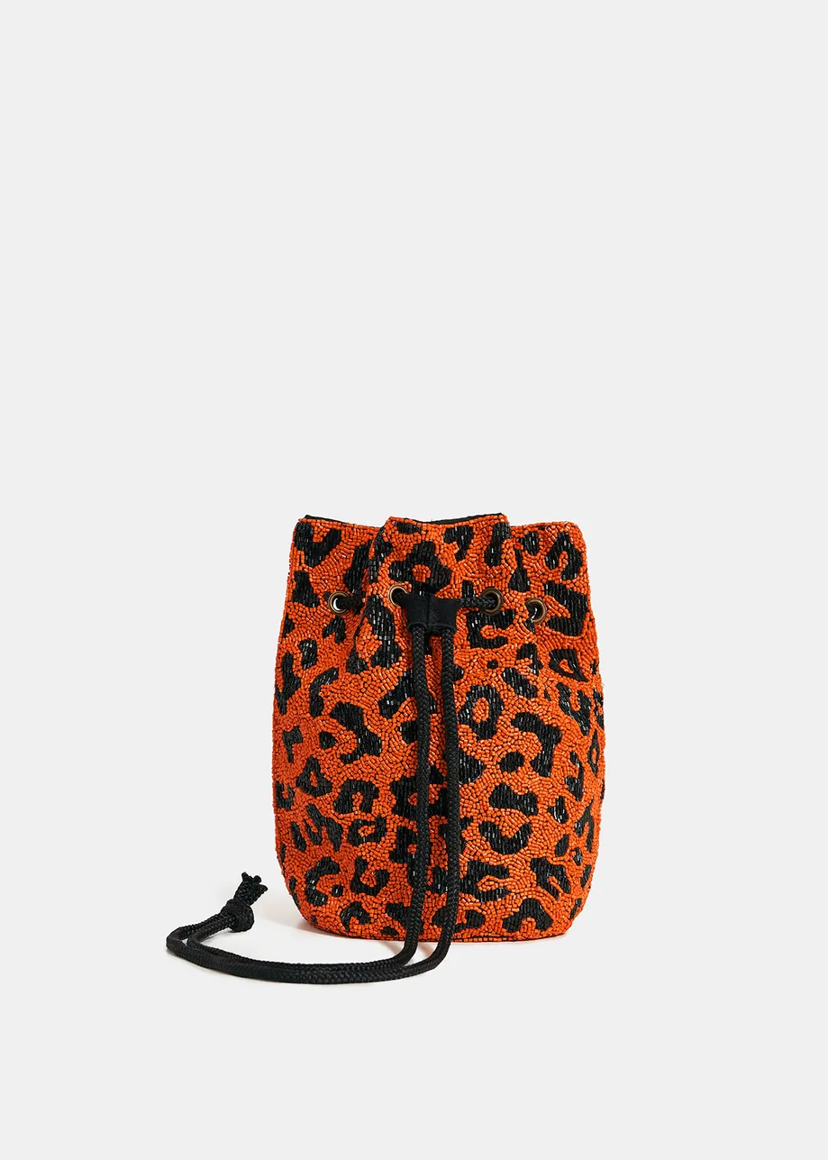 Orange bead-embellished mini bag with leopard motif