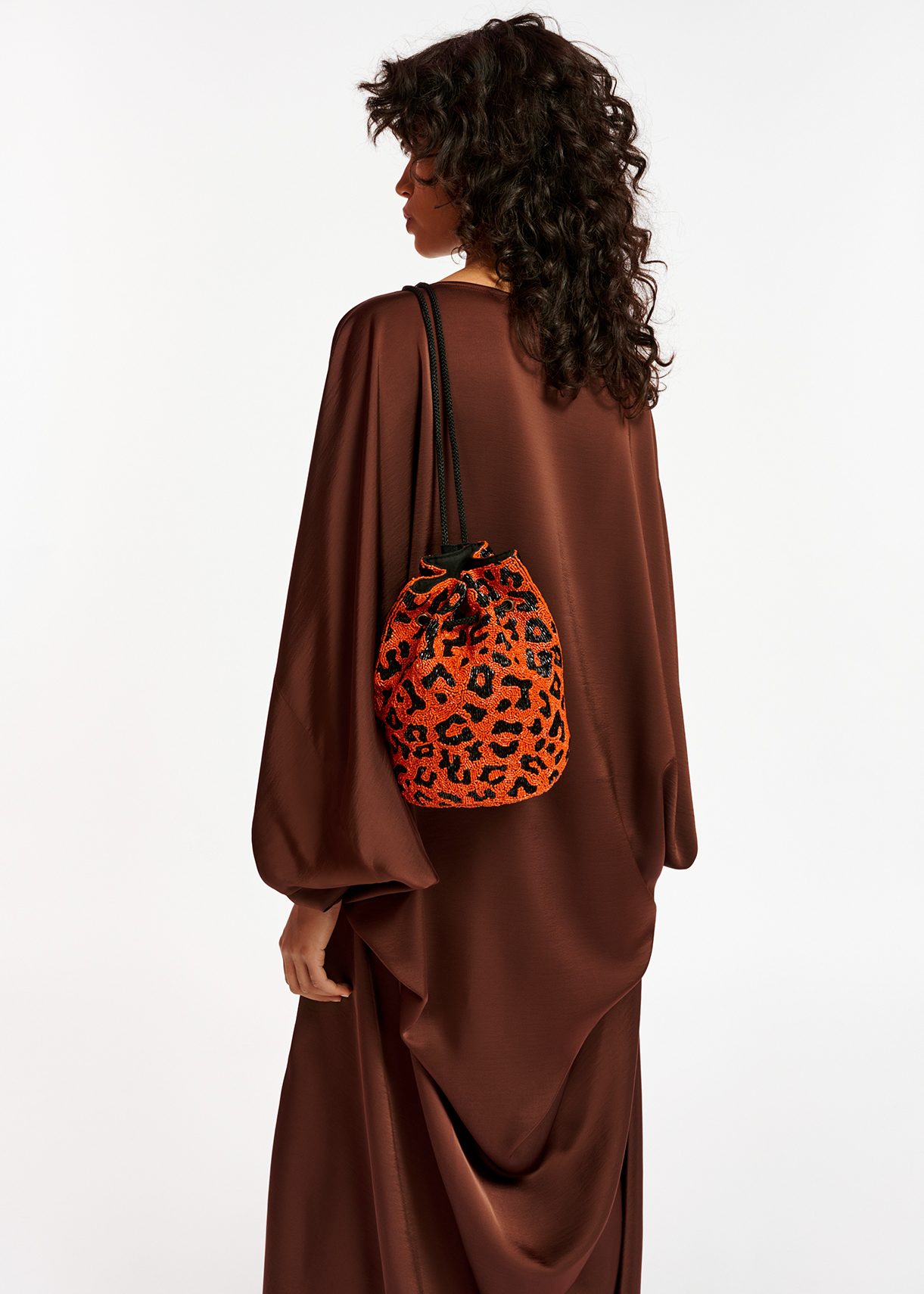 Orange bead-embellished mini bag with leopard motif