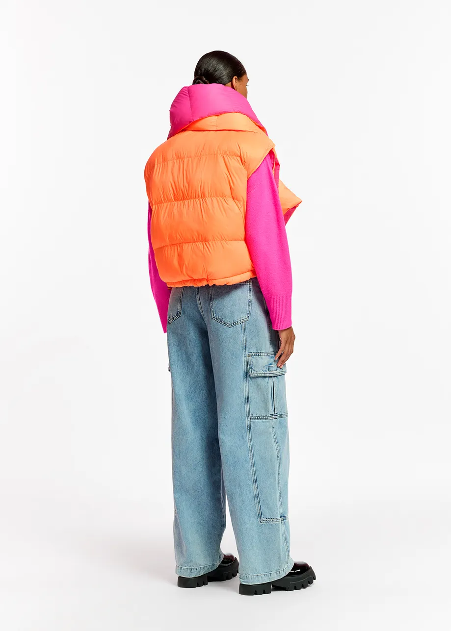 Orange and neon pink reversible puffer vest