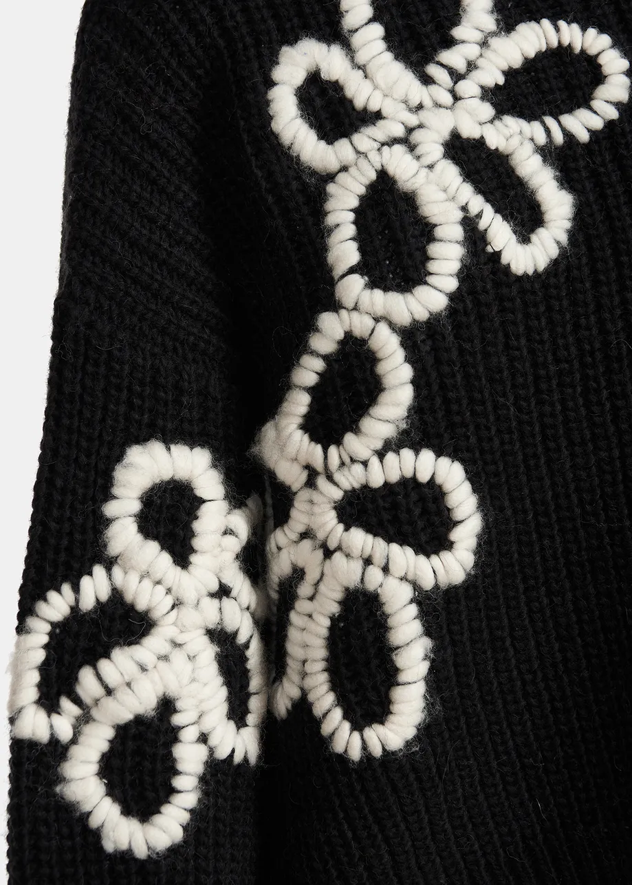 Pull en tricot noir à fleurs brodées | Essentiel Antwerp France