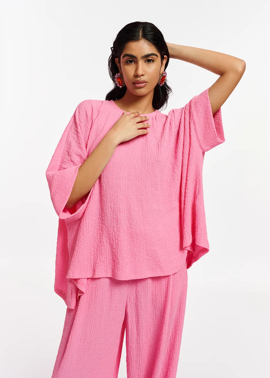 Roze oversized top in cloqué