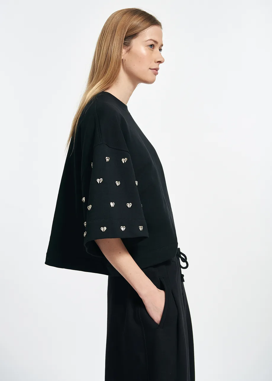 Black sweatshirt with rhinestone embellishments