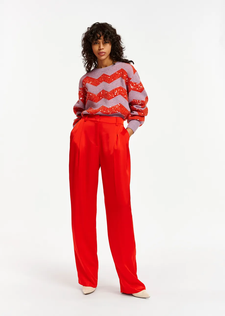 Red tapered-leg satin pants