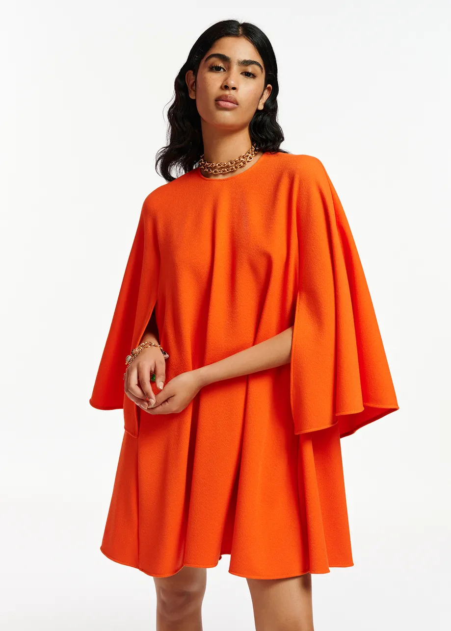 Orange A-line mini dress with cape-like sleeves