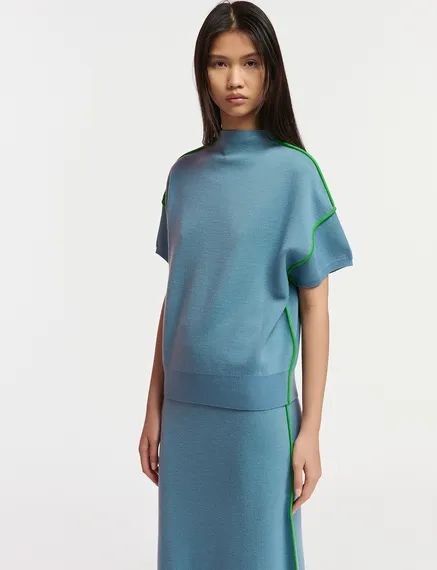 Blue short-sleeved sweater with green piping