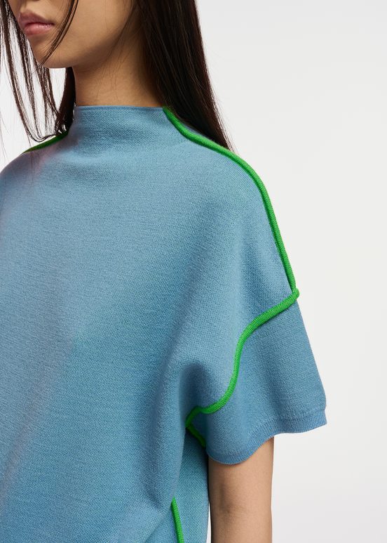 Blue short-sleeved sweater with green piping