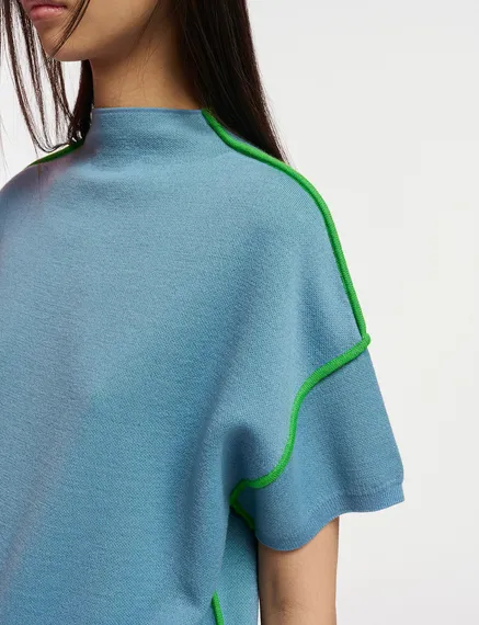 Blue short-sleeved sweater with green piping