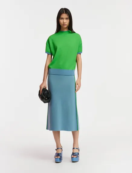 Blue short-sleeved sweater with green piping