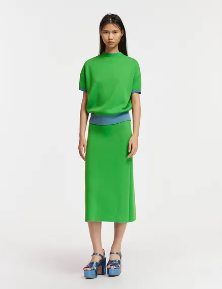 Blue short-sleeved sweater with green piping