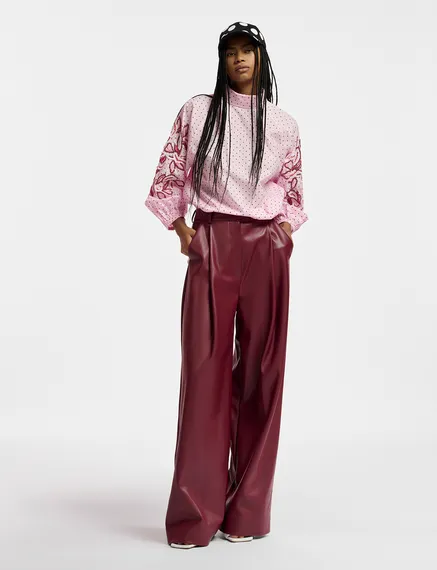 Burgundy faux leather pants