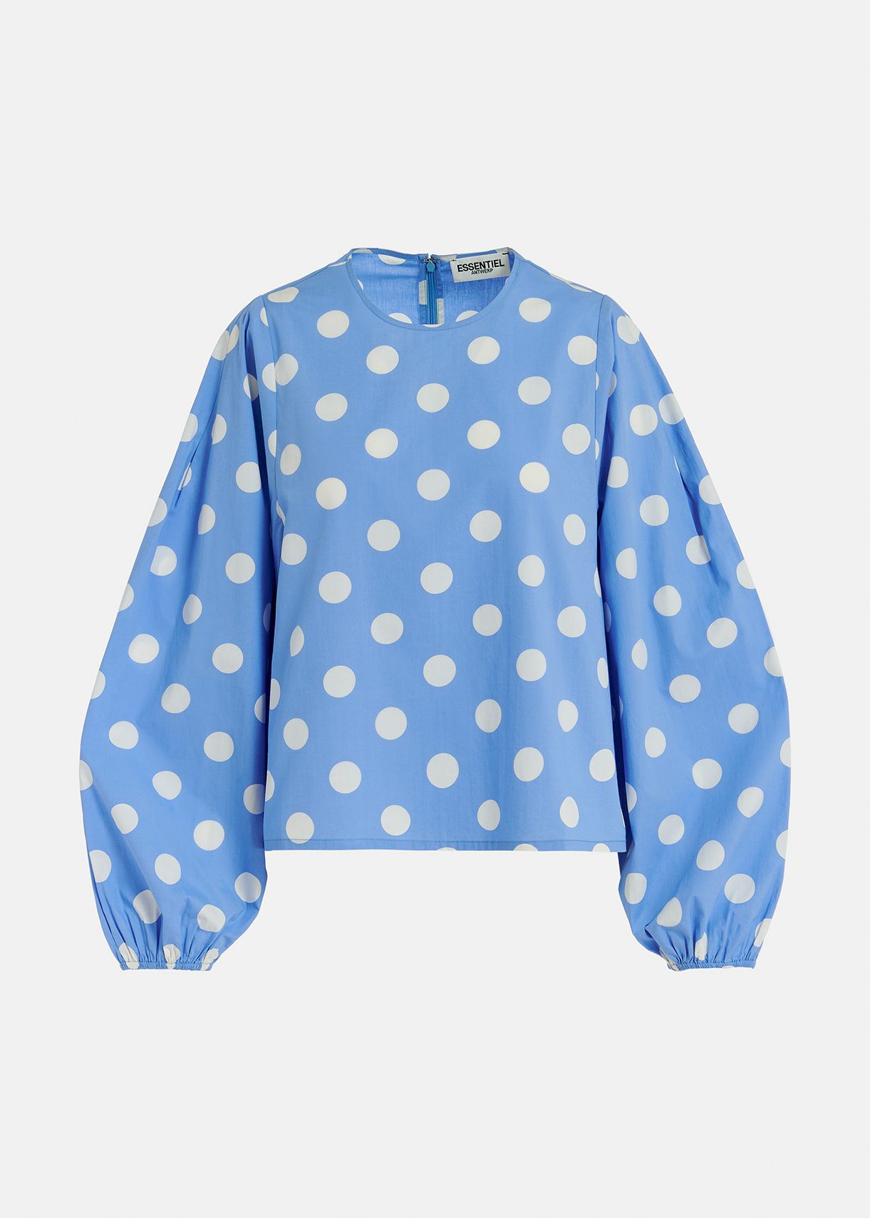 Blue and white polka-dot top with puffed sleeves