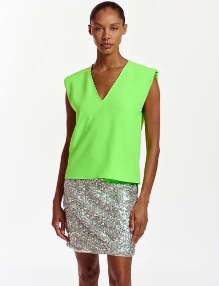 Neon green sleeveless V-neck top