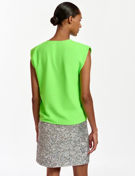 Neon green sleeveless V-neck top