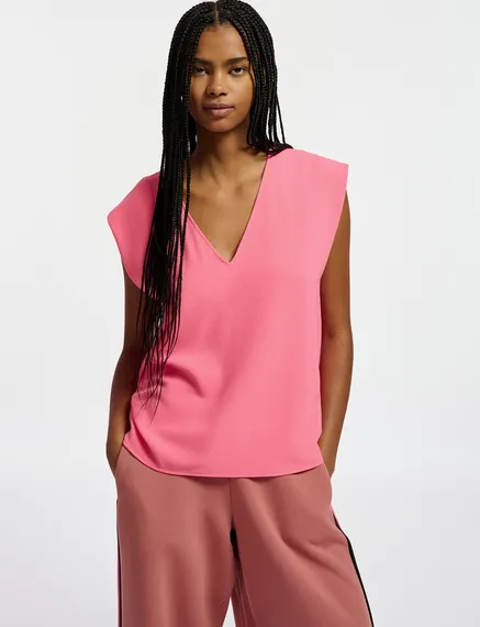 Pink sleeveless V-neck top