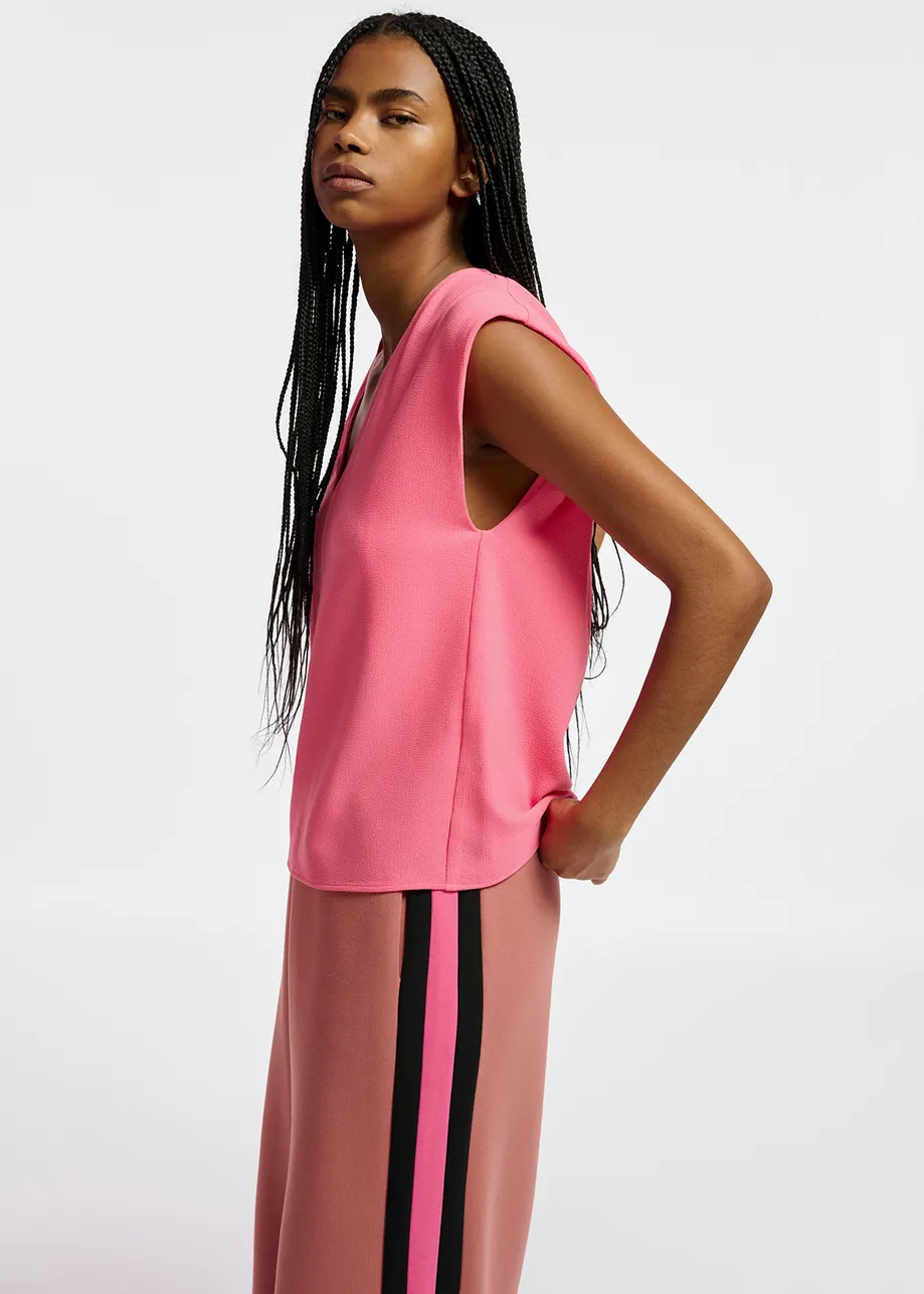 Pink sleeveless V-neck top