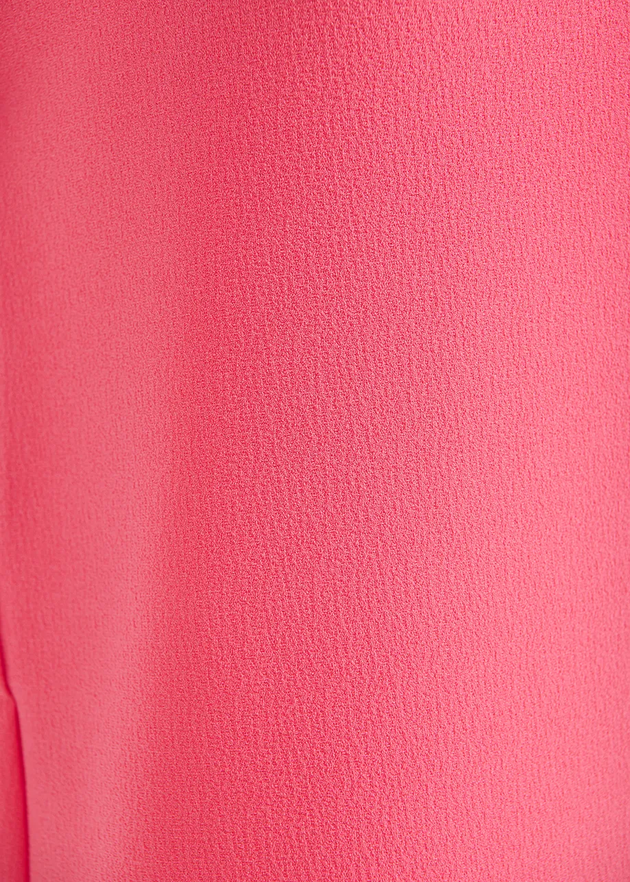 Pink sleeveless V-neck top