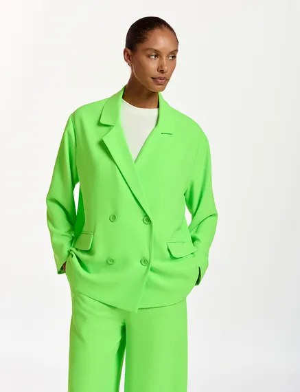 Neon green double-breasted blazer