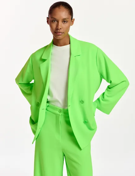 Neon green double-breasted blazer