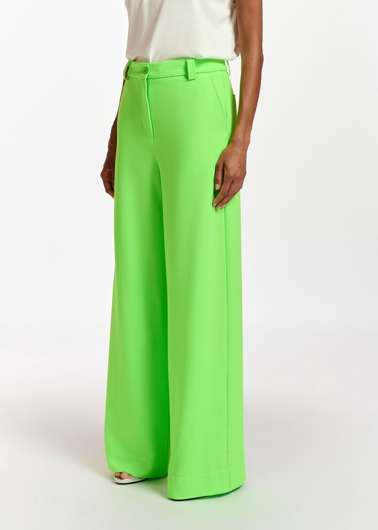 Fluogroene broek met brede pijpen