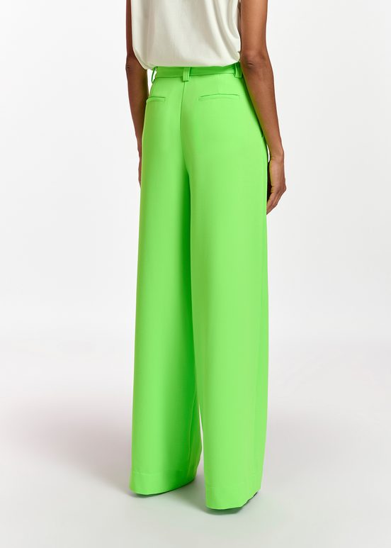 Fluogroene broek met brede pijpen