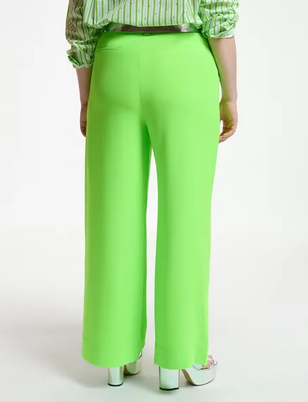 Fluogroene broek met brede pijpen