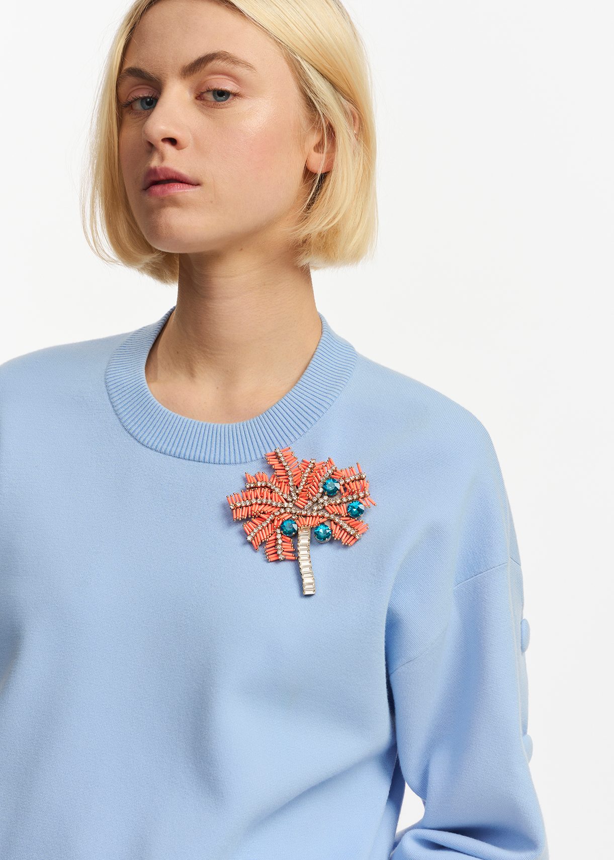 Oranje, zilveren en blauwe palmboombroche