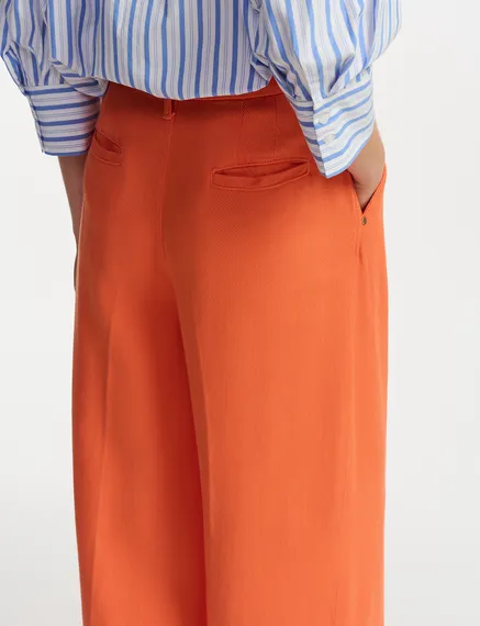 Oranje broek met brede pijpen