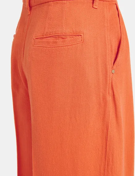 Oranje broek met brede pijpen