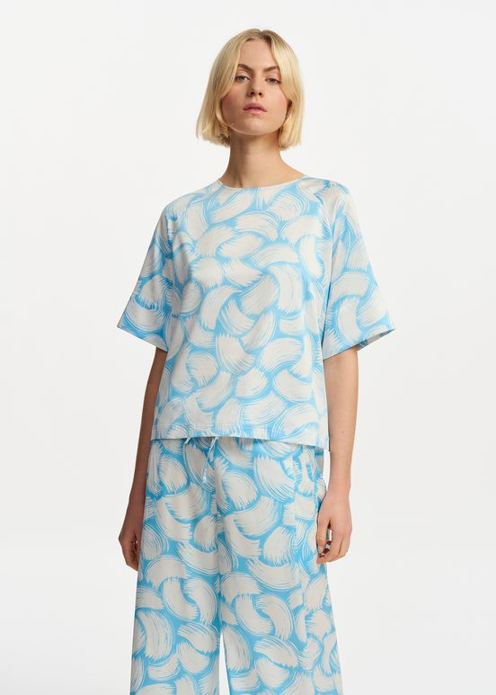 Blauwe en gebroken witte oversized top met print