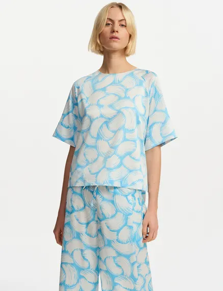 Blauwe en gebroken witte oversized top met print