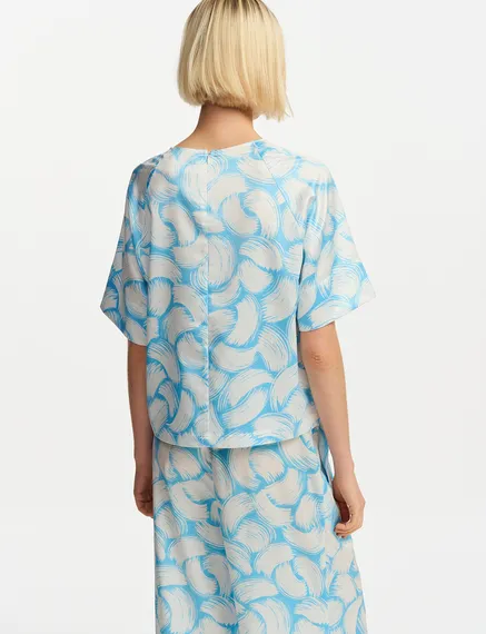 Oversized Oberteil mit abstraktem Print in Blau und Cremeweiß