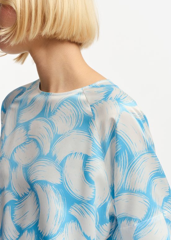 Blauwe en gebroken witte oversized top met print