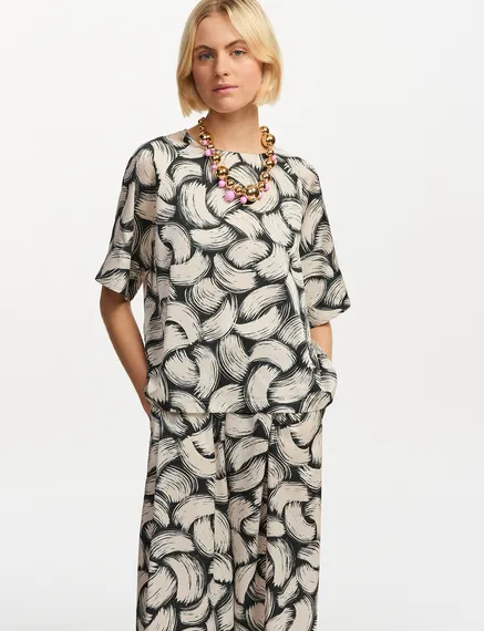 Black and off-white abstract-print oversized top