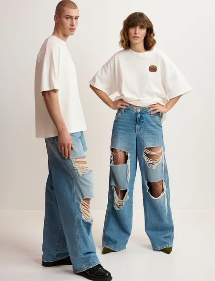 Blaue Jeans mit weitem Bein in Used-Optik