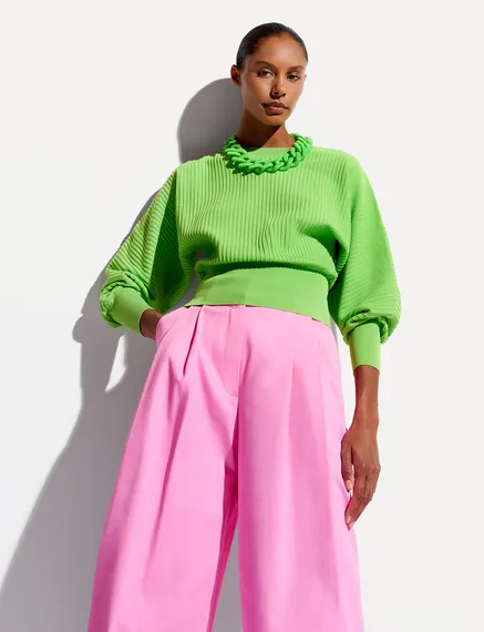 Green knitted sweater with fitted waist