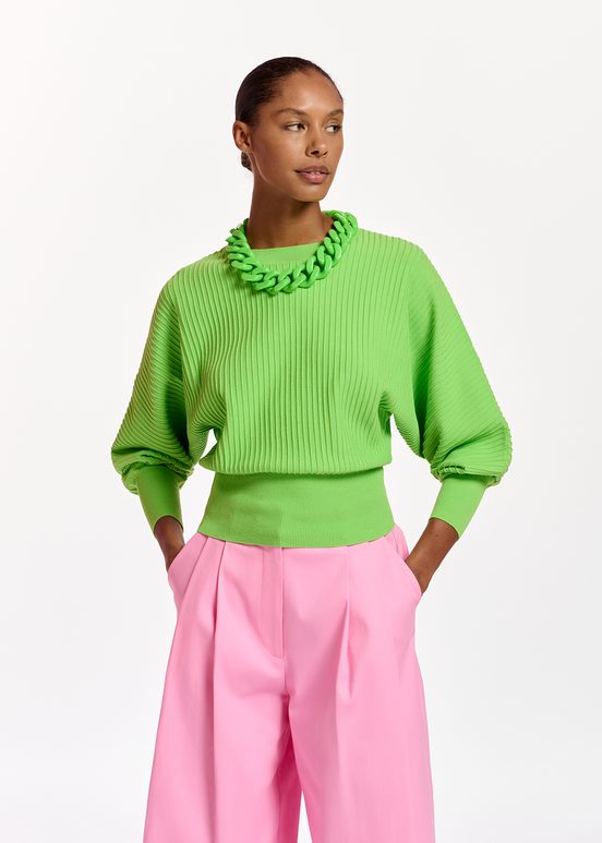 Green knitted sweater with fitted waist