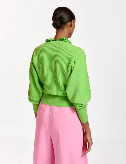 Green knitted sweater with fitted waist