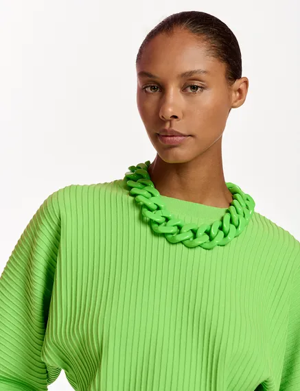 Green knitted sweater with fitted waist