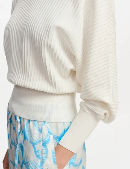 Off-white knitted sweater with fitted waist