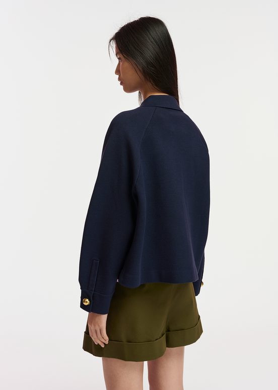 Navy blue knitted jacket with faux leather patch pockets