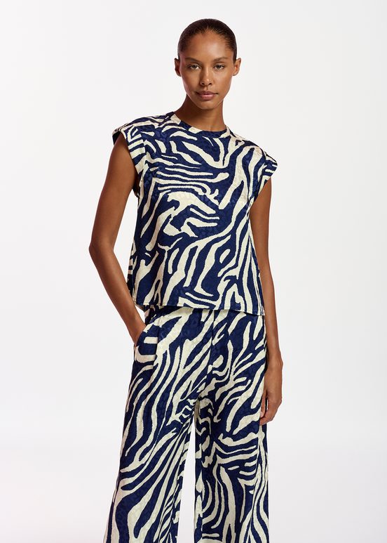 Navy blue and off-white zebra-print top