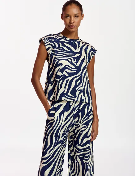 Navy blue and off-white zebra-print top