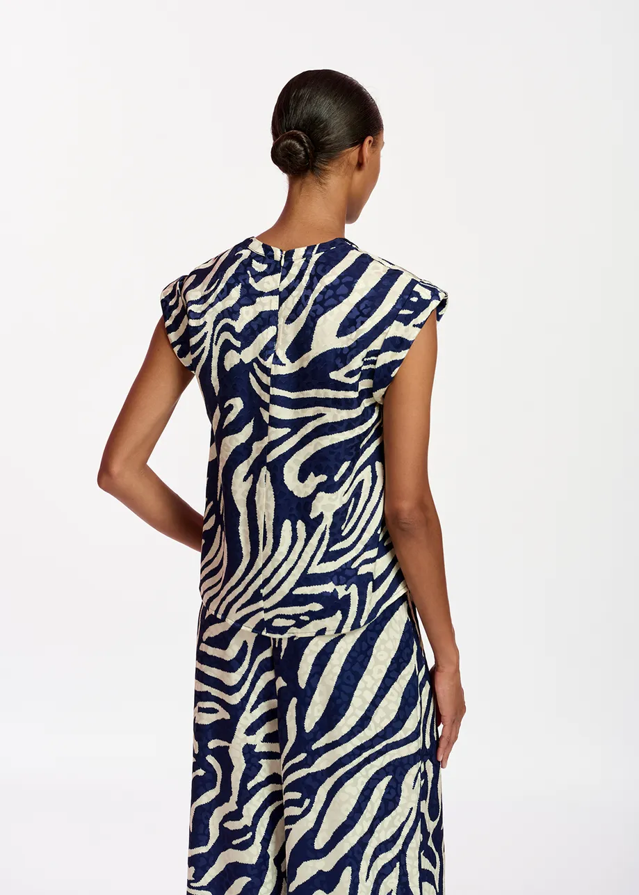 Navy blue and off-white zebra-print top