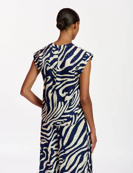 Navy blue and off-white zebra-print top